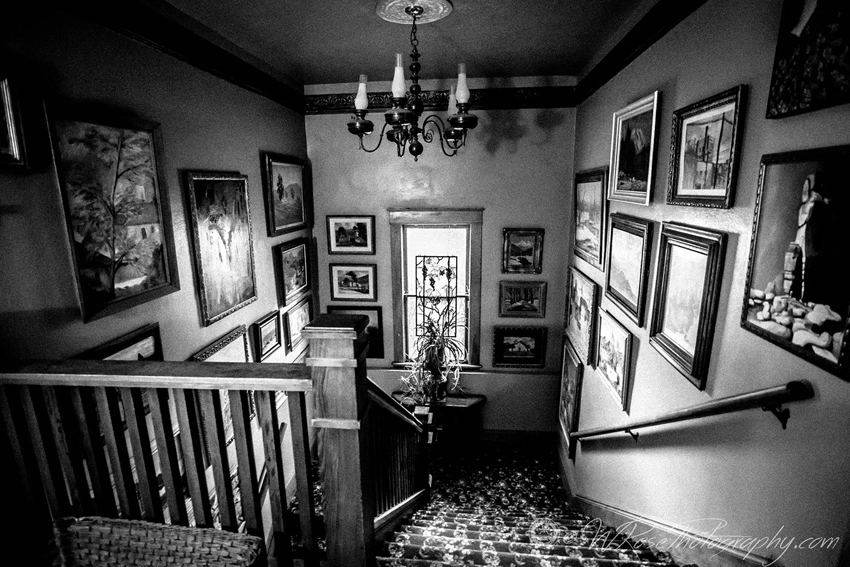Black and white photo of the stairwell at the Simpson Hotel