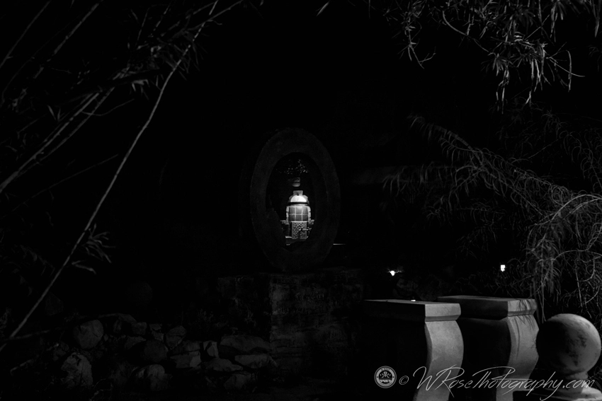 Black and white photo of an outdoor sink at night in the garden at the Simpson Hotel