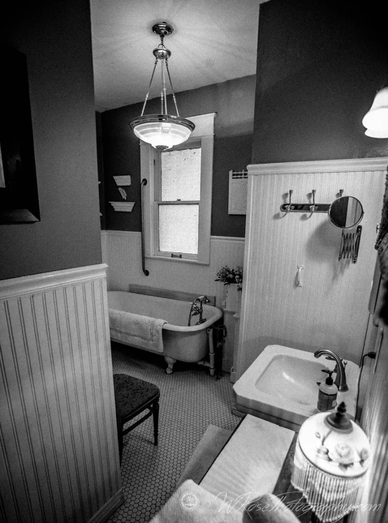 Bathroom with clawfoot tub at the Simpson Hotel