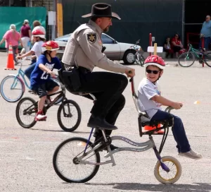 Duncan sheriff on a bicycle